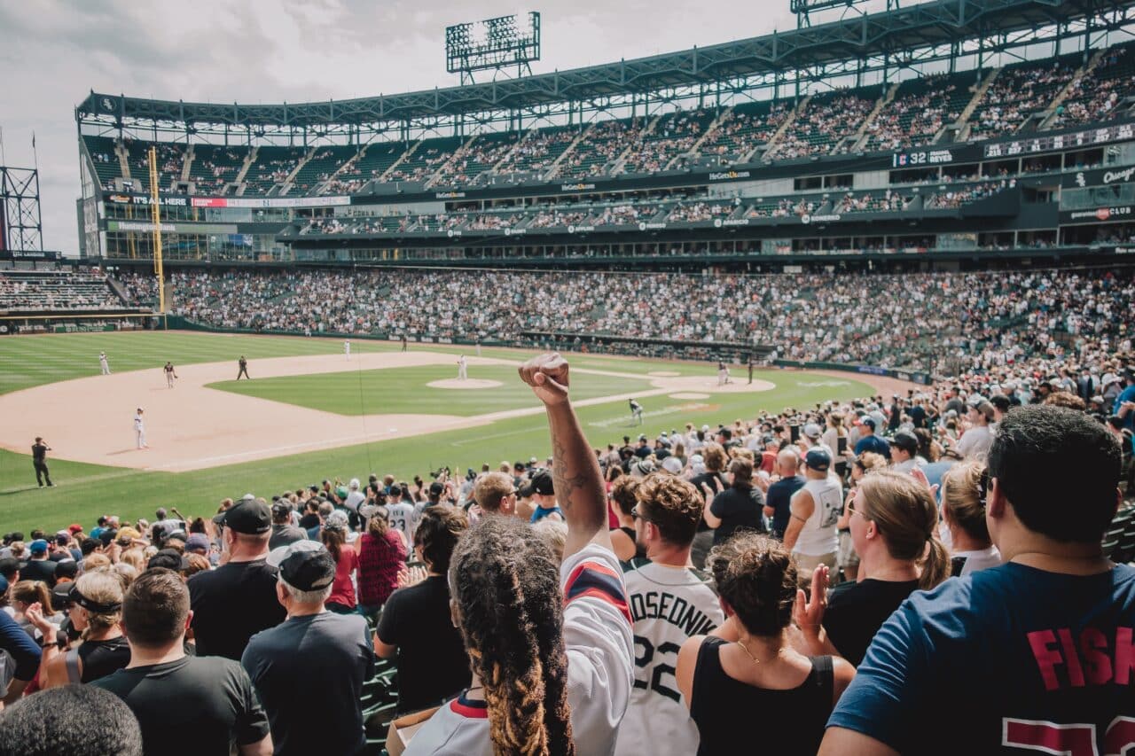 Cheering crowd at a baseball game.